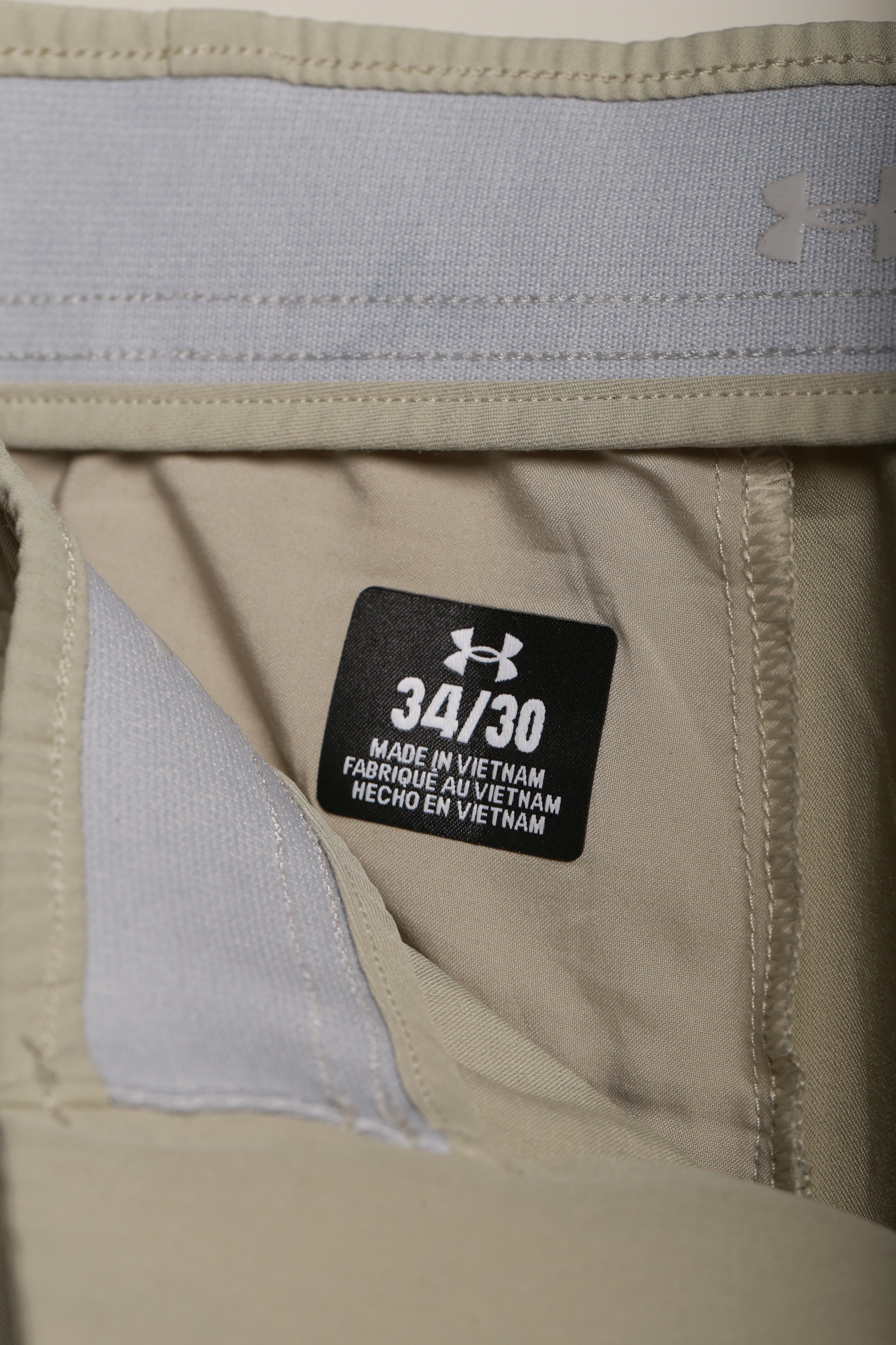 Męskie spodnie Under Armour 34x30 – beżowe